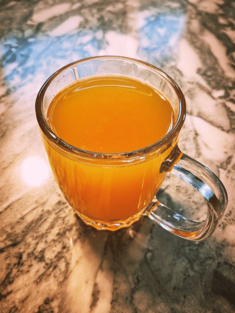 Dr Gupta honey recipe warm drink in glass mug